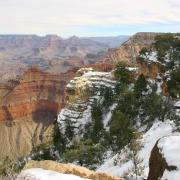 Fresh snowfalls contrast with the rich colours of Grand Canyon, Arizona, USA
